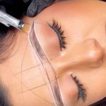 measuring and shaping brows for perfect symmetry before